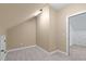 Cozy bedroom with carpet flooring and ample natural light, providing a comfortable retreat at 6509 Duncans Creek Ct, Fuquay Varina, NC 27526