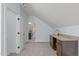 Bonus room features carpet, wet bar, and adjacent bathroom at 6509 Duncans Creek Ct, Fuquay Varina, NC 27526