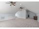 Versatile bonus room with ceiling fans, wet bar, and access to the bathroom at 6509 Duncans Creek Ct, Fuquay Varina, NC 27526