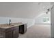 Bonus room with a wet bar providing a convenient space for entertaining and hosting guests at 6509 Duncans Creek Ct, Fuquay Varina, NC 27526