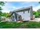 Back exterior view of the home featuring the deck, patio, and basketball court at 6509 Duncans Creek Ct, Fuquay Varina, NC 27526