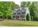 Lovely two-story home with an inviting front porch and manicured lawn at 6509 Duncans Creek Ct, Fuquay Varina, NC 27526