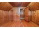 Charming attic with wooden ceiling and walls offering a cozy retreat space with natural wood and unique design at 701 E Nash St, Spring Hope, NC 27882