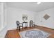 Inviting living room with hardwood floors, light walls, and traditional decor at 701 E Nash St, Spring Hope, NC 27882