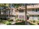 Residential townhomes feature tidy front lawns, walkways and convenient parking at 704 Benchmark Dr, Raleigh, NC 27615