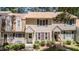Attractive townhome with manicured landscaping, steps to the front door and bench at 704 Benchmark Dr, Raleigh, NC 27615