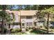 Charming townhome community with tree-lined streets and well-kept lawns at 704 Benchmark Dr, Raleigh, NC 27615
