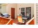 Cozy outdoor patio with dining table, chairs, and grill, perfect for outdoor entertaining at 704 Benchmark Dr, Raleigh, NC 27615