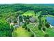 Lush golf course with tree-lined fairways and serene lake, a beautiful place to call home at 74002 Harvey, Chapel Hill, NC 27517