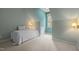 Cozy bedroom with a dormer window, light walls, and sconce lighting fixtures at 74002 Harvey, Chapel Hill, NC 27517