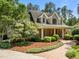 Charming two-story home with lush landscaping and inviting curb appeal at 74002 Harvey, Chapel Hill, NC 27517