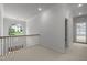 Bright hallway with a large window offering natural light and views of the exterior at 74002 Harvey, Chapel Hill, NC 27517