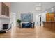 Elegant living room with fireplace, hardwood floors, and bright natural light at 74002 Harvey, Chapel Hill, NC 27517