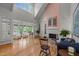 Large living room with fireplace, hardwood floors, and an open floor plan at 74002 Harvey, Chapel Hill, NC 27517