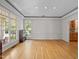 Bright and airy living room with large windows and hardwood flooring at 74002 Harvey, Chapel Hill, NC 27517