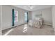 Comfortable bedroom with plush carpeting, soft lighting, and a serene ambiance at 8113 Huskfield Ct, Apex, NC 27539