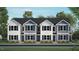 A new townhouse showcasing a modern exterior with clean lines, complemented by fresh landscaping and a welcoming entrance at 8538 Beckett Chase Way, Raleigh, NC 27616