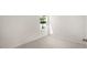 A small bedroom with neutral carpet and a window that lets in plenty of natural light at 8540 Beckett Chase Way, Raleigh, NC 27616