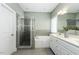 Beautiful bathroom with a glass shower, garden tub, double vanity and modern fixtures at 870 Live Oak Ln, Nashville, NC 27856