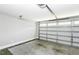 A clean, empty garage with a concrete floor and an insulated garage door at 870 Live Oak Ln, Nashville, NC 27856