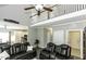 Open-concept living room featuring a high ceiling, hardwood floors, and loft overlook at 870 Live Oak Ln, Nashville, NC 27856
