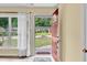 Bright entryway showcasing the red front door and stylish interior design at 1007 Ancroft Ave, Durham, NC 27713