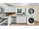 The kitchen includes modern washer and dryer units at 1007 Ancroft Ave, Durham, NC 27713