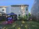 Large backyard with a gazebo and playhouse provides shade and entertainment for outdoor enjoyment at 1030 Thoughtful Spot Ln, Durham, NC 27703
