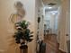 Stylish hallway featuring hardwood floors, decorative mirrors, and elegant decor at 1030 Thoughtful Spot Ln, Durham, NC 27703