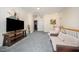 Cozy upstairs living room featuring neutral decor, a media center, and plush gray carpeting at 1030 Thoughtful Spot Ln, Durham, NC 27703