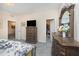 Charming main bedroom featuring a walk-in closet, ample dresser space, and plush carpeting at 1030 Thoughtful Spot Ln, Durham, NC 27703