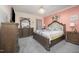 Spacious main bedroom featuring a chandelier, decorative accents, and luxurious furnishings at 1030 Thoughtful Spot Ln, Durham, NC 27703