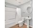 Bathroom with white fixtures and combination tub and shower at 104 Windorah Place Pl, Chapel Hill, NC 27517