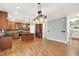Well-equipped kitchen with stainless appliances, ample counter space, and a seamless transition to the dining area at 104 Windorah Place Pl, Chapel Hill, NC 27517