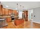A fully-equipped kitchen with stainless steel appliances and a functional center island at 104 Windorah Place Pl, Chapel Hill, NC 27517