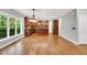 Spacious kitchen featuring wood cabinets, island, and modern appliances, adjacent to dining area at 104 Windorah Place Pl, Chapel Hill, NC 27517