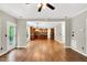 Open floor plan living and kitchen area features hardwood floors and lots of natural light at 104 Windorah Place Pl, Chapel Hill, NC 27517