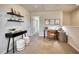 Upstairs hallway with desks, shelving, and natural light at 1043 Winding Spring Dr, Mebane, NC 27302