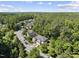 Aerial view of neighborhood featuring well-maintained homes and mature trees at 106 Bluefield Rd, Chapel Hill, NC 27517