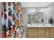 Bright bathroom with double sink vanity, floral shower curtain, and ample lighting at 106 Bluefield Rd, Chapel Hill, NC 27517