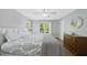 Cozy bedroom featuring hardwood floors, natural light, and classic furniture at 106 Bluefield Rd, Chapel Hill, NC 27517