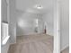 Well-lit bedroom with views to the entry to the bedroom, bathroom and closet at 108 Valley View Dr, Chapel Hill, NC 27516