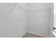 Practical walk-in closet offering ample storage space and ready for organization at 108 Valley View Dr, Chapel Hill, NC 27516