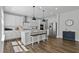 Well-appointed kitchen featuring white cabinets, stainless steel appliances, and a convenient center island at 108 Valley View Dr, Chapel Hill, NC 27516