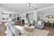Spacious living room with hardwood floors and view of kitchen and dining room at 108 Valley View Dr, Chapel Hill, NC 27516