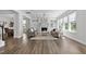Inviting living room with a fireplace, built-in shelves, and large windows offering ample natural light at 108 Valley View Dr, Chapel Hill, NC 27516
