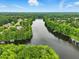Beautiful aerial view of the lakefront community surrounded by lush greenery at 1093 N Lakeside Dr, Smithfield, NC 27577