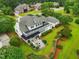 Expansive backyard with patio area with a well-manicured lawn and mature landscaping at 1093 N Lakeside Dr, Smithfield, NC 27577