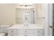 Well-lit bathroom features a classic white vanity with ample counter space at 1093 N Lakeside Dr, Smithfield, NC 27577