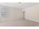 Neutral bedroom with carpet floors and natural light perfect for relaxation at 1093 N Lakeside Dr, Smithfield, NC 27577